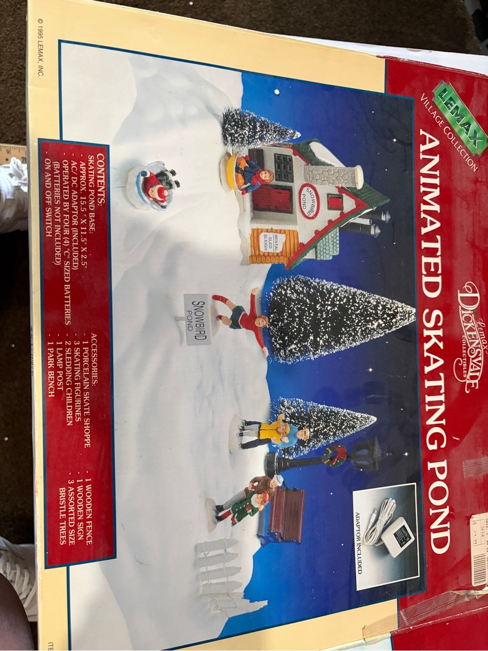 Department 56 Animated Skating Pond Accent - Blue, White, Red, Green